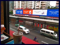 Tianhe Road seen from a KFC. The cars are very modern, many of European models. The toilets, even in KFC, are just holes and never have soap or toilet paper!